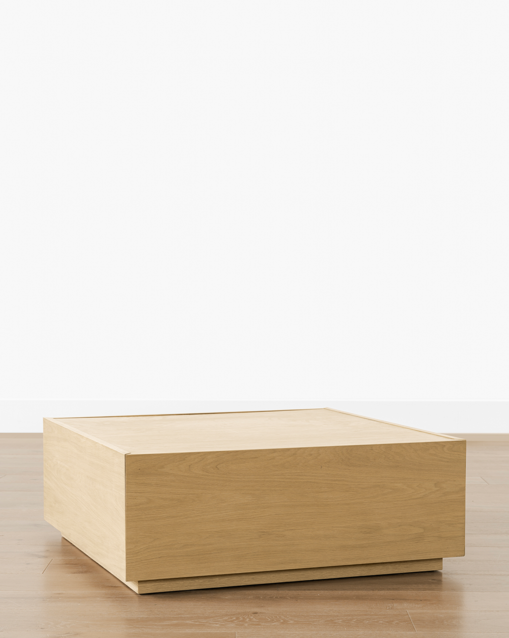 Table basse en bois moderne avec tiroirs de rangement coulissants et lignes épurées pour salon