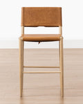Tabouret de comptoir en bois naturel et cuir avec détails de sangles arrondies pour salle à manger
