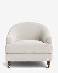 Fauteuil club classique rembourré avec accoudoirs roulés, passepoil décoratif et roulettes, pour le salon
