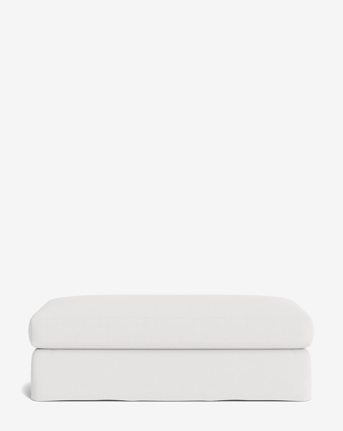 Pouf moderne déhoussable en tissu facile d'entretien et silhouette décontractée pour le salon